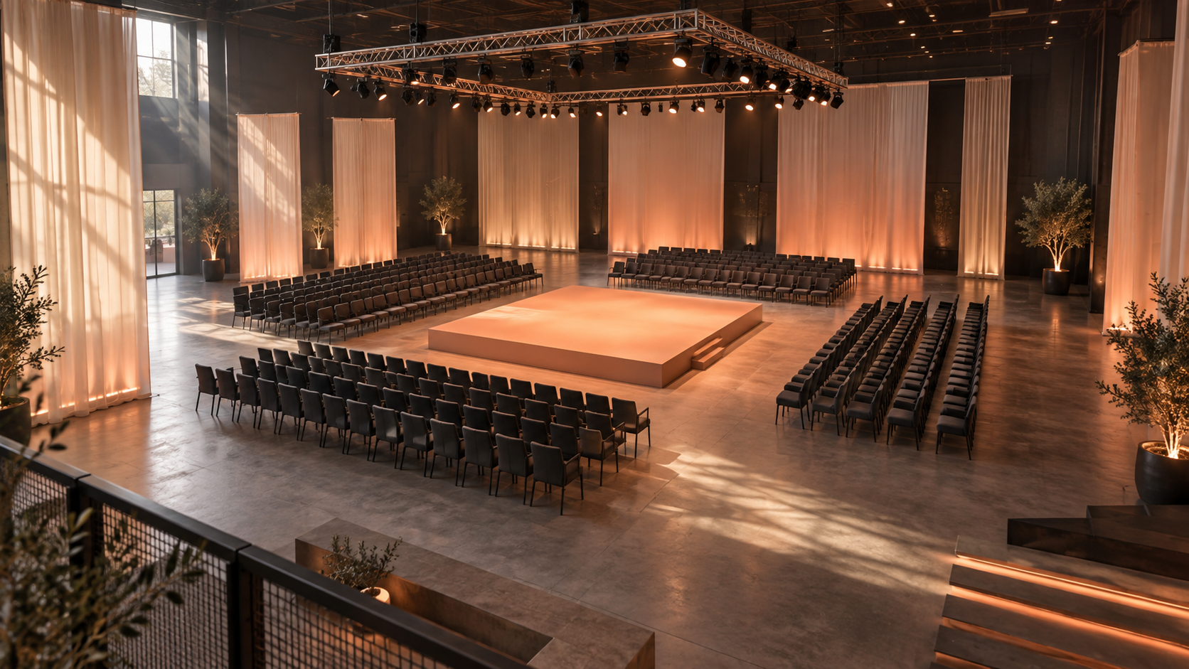 Original event floor plan with a central presentation space and surrounding seating